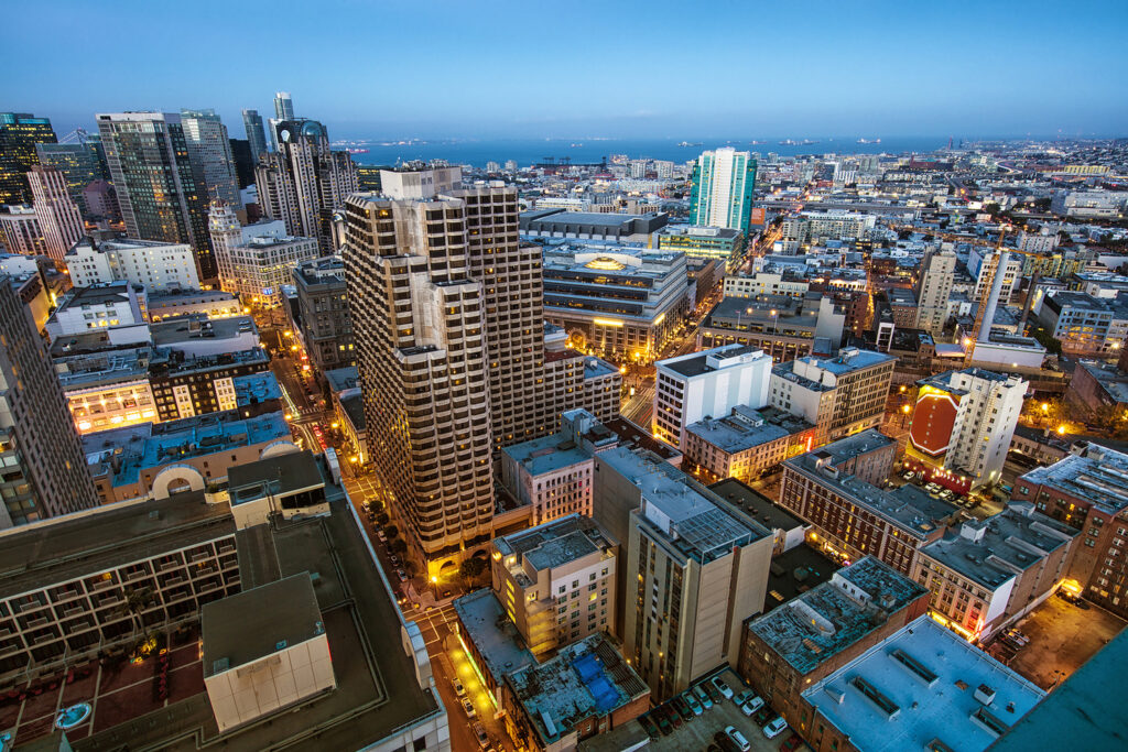 San Francisco Financial District skyline along Market Street near the Samer Habbas & Associates personal injury office at 575 Market Street.
